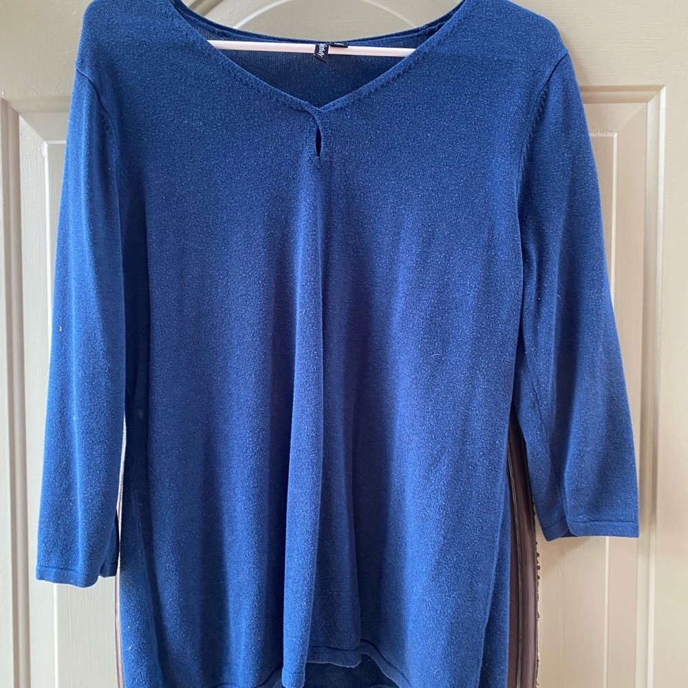 Dark blue, thin women’s sweater. Size XL but fits more like a large. 3/4 sleeve.